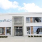 Fachada da loja Tulipa Baby em dia ensolarado